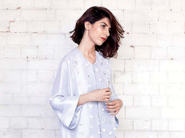 her designs incorporated 3d and fabric manipulation techniques using plastic wires cut in different sizes beads and even polythene balls photo publicity
