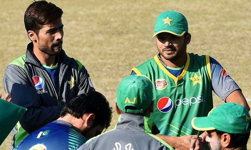 pakistan odi captain with pacer muhammad amir during training camp at gaddafi stadium in lahore photo afp