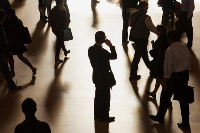 a man stands in the middle of grand central terminal as he speaks on a cell phone as passengers face limited train service on the new haven line between stamford station and grand central terminal due to a con edison power problem in new york september 25 2013 photo reuters