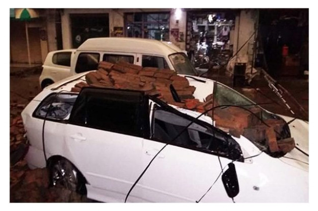 a view of car which was damaged during heavy storm photo online a view of car which was damaged during heavy storm photo online