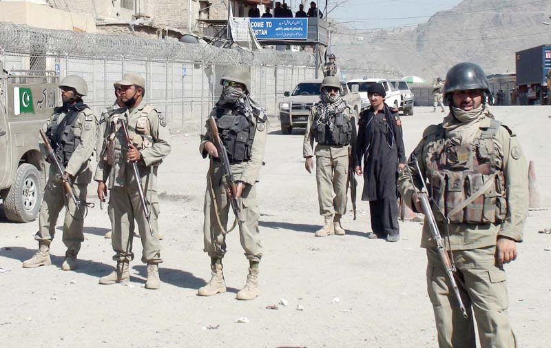 security forces personnel stand near the site of the bomb blast at the torkhan border crossing photo inp