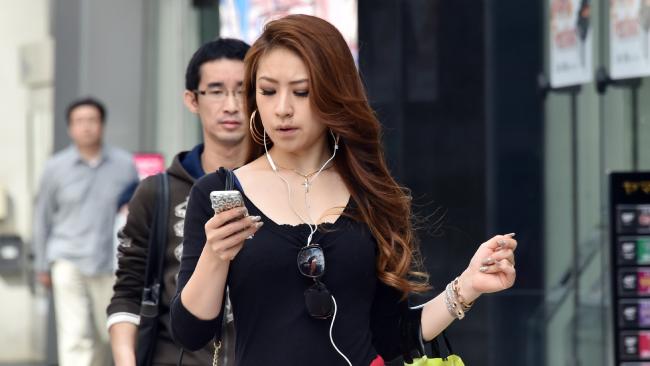 the lights are aimed at pedestrians using mobile phones who are not looking where they are walking photo afp