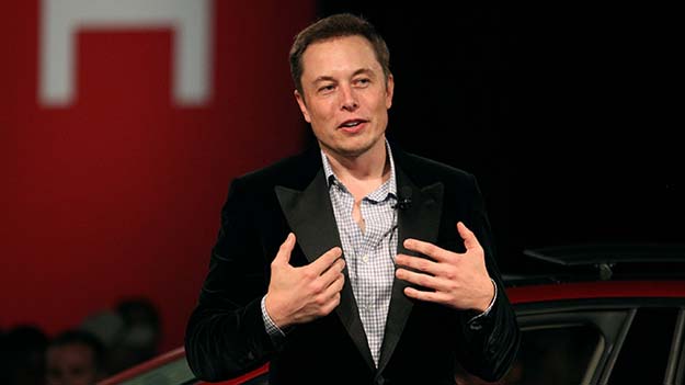 musk spars with bernie sanders offers to sell more tesla stock