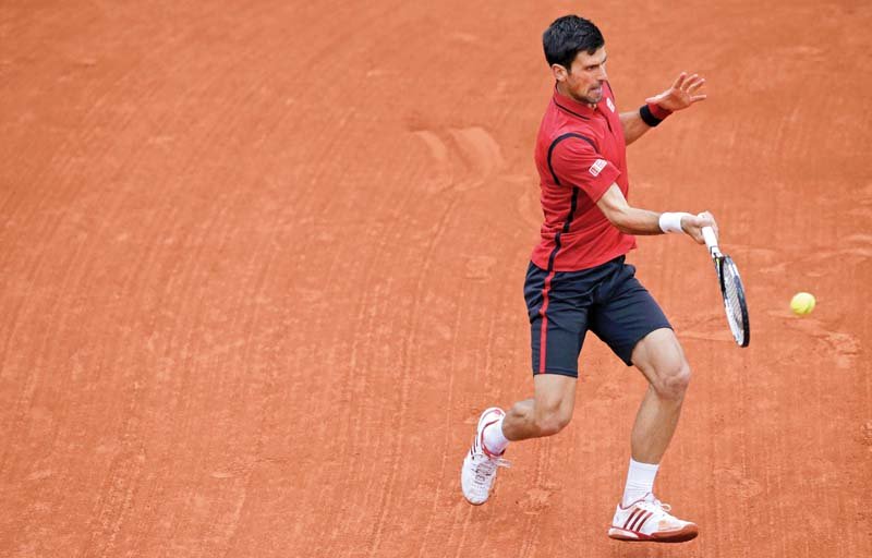 djokovic seemed more troubled by the weather than he did by berdych as he barely had to shift gears to register a simple win photo reuters