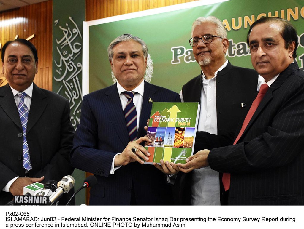 finance minister ishaq dar presents the economic survey 2015 16 during a press conference in islamabad on thursday photo pid