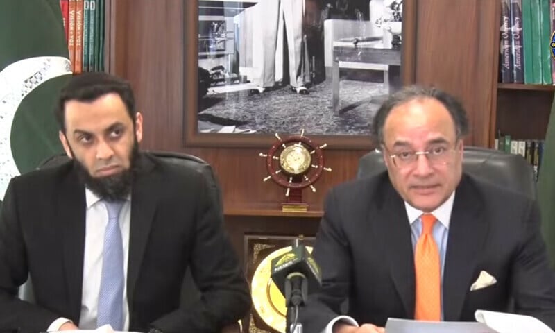 finance minister muhammad aurangzeb and information minister attaullah tarar address a press conference on tuesday photo screengrab