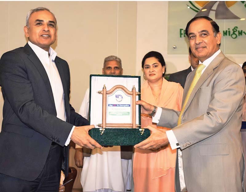 nab chairman qamar zaman chaudhry presents a souvenir to nha chairman shahid ashraf tarar photo online