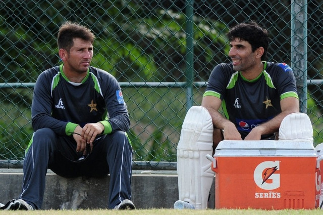 misbahul haq and yasir shah take a breather in pallekele on july 2 2015 photo afp misbahul haq and yasir shah take a breather in pallekele on july 2 2015 photo afp