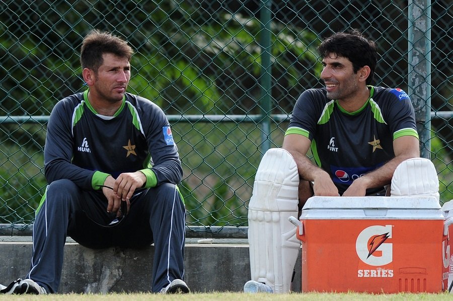 misbahul haq and yasir shah take a breather in pallekele on july 2 2015 photo afp