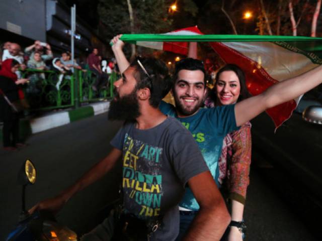 people celebrate in iran photo afp