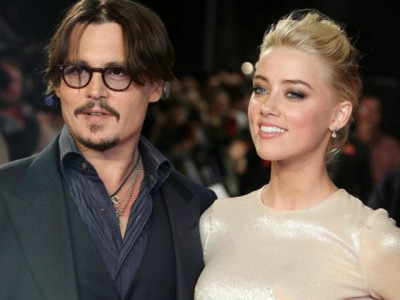 amber heard sues comedian for defamation over johnny depp