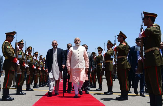 indian prime minister narendra modi c arrives ahead of the inauguration of the salma hydroelectric dam in herat on june 4 2016 photo afp