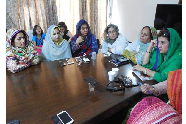 pti women wing k p president naseem hayat chairing a meeting held at pti s provincial secretariat photo express