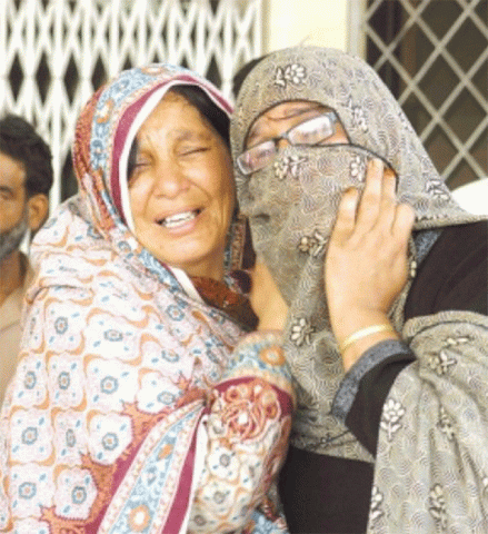 families of the victim grieve on her burial file photo families of the victim grieve on her burial file photo