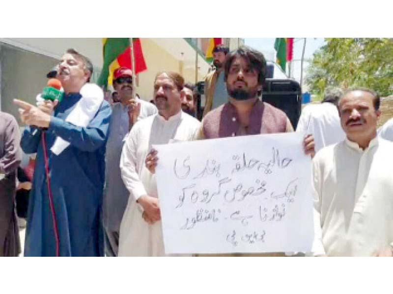 activists of different political parties protest outside the provincial election commission in quetta against demarcation photo express