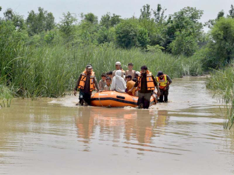 rescue 1122 personnel evacuate people from a flood affected village in the warsak area of khyber pakhtunkhwa photo app