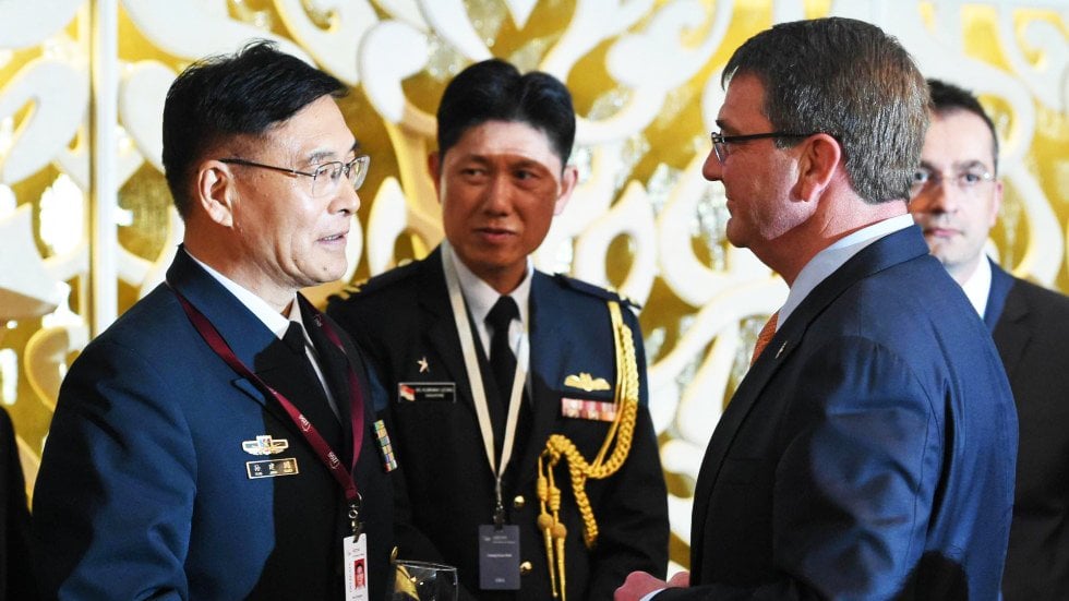 pla admiral sun jianguo who is leading the chinese delegation chats with us secretary photo afp