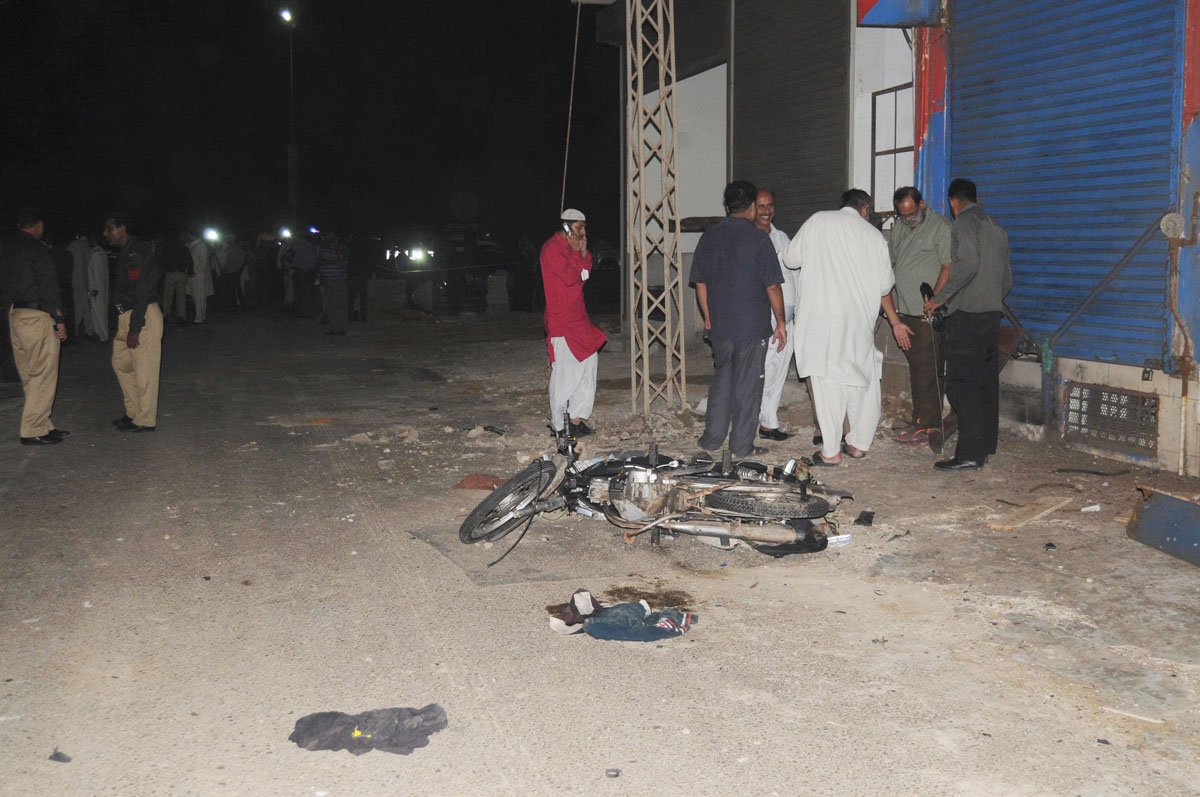 a file photo showing officials gathering outside a liquor store on khayaban e muslim karachi after a blast photo mohammmad noman express