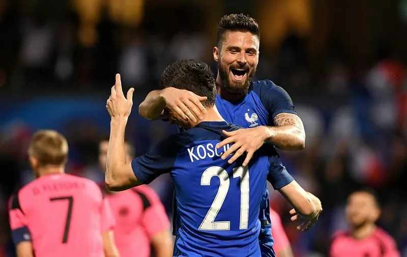 laurent koscielny is congratuled by olivier giroud during the friendly football match between france and scotland at the st symphorien stadium in longeville l s metz eastern france on june 4 2016 photo afp laurent koscielny is congratuled by olivier giroud during the friendly football match between france and scotland at the st symphorien stadium in longeville l s metz eastern france on june 4 2016 photo afp