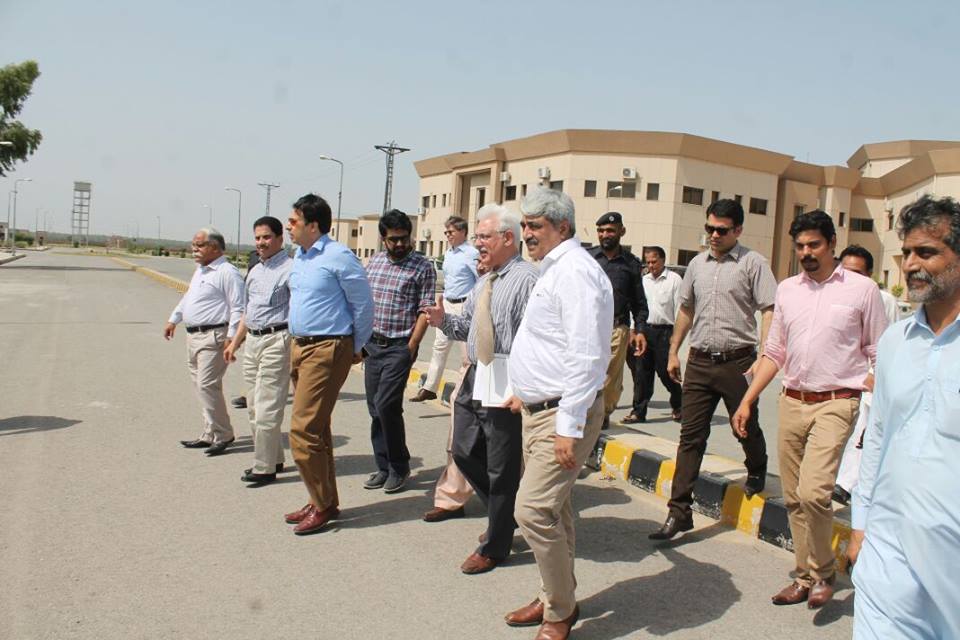 adviser to chief minister on health khawaja salman raffique seen during a visit to the under construction hospital photo online