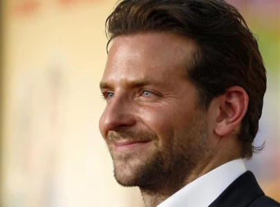 bradley cooper sports mutton chops with chin strap beard