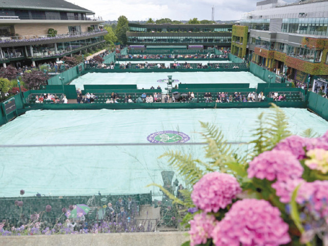 rain covers are pictured on courts 14 15 16 on the fifth day of the 2024 wimbledon championships at the all england lawn tennis and croquet club photo afp rain covers are pictured on courts 14 15 16 on the fifth day of the 2024 wimbledon championships at the all england lawn tennis and croquet club photo afp