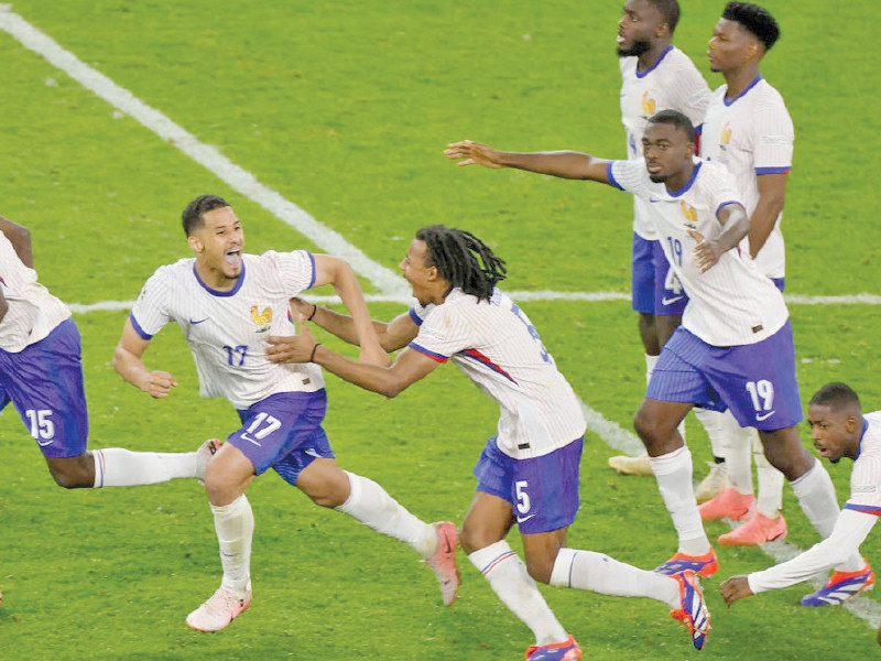 france players celebrate their quarter final victory via a penalty shoot out against portugal at euro 2024 photo afp