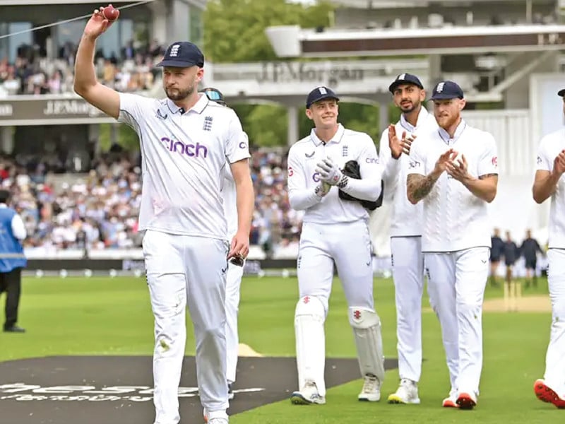england s gus atkinson celebrates after dismissing west indies captain kraigg brathwaite his maiden wicket in a debut haul of 7 45 in the first test at lord s photo afp