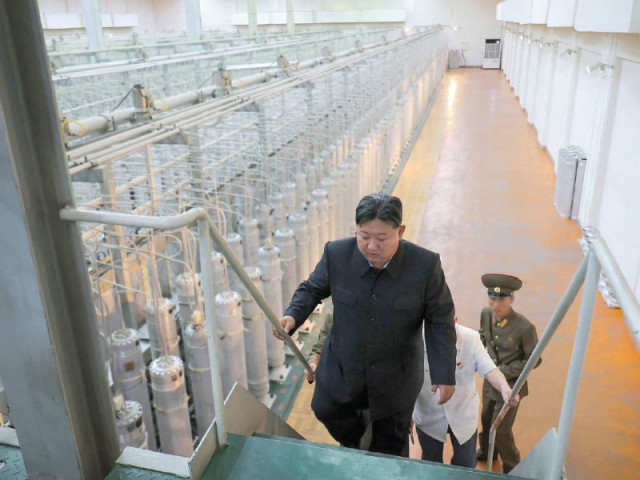 north korean leader kim jong un inspects the nuclear weapons institute and the production base of weapon grade nuclear materials at an undisclosed location in north korea photo afp north korean leader kim jong un inspects the nuclear weapons institute and the production base of weapon grade nuclear materials at an undisclosed location in north korea photo afp
