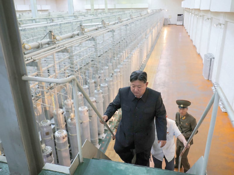 north korean leader kim jong un inspects the nuclear weapons institute and the production base of weapon grade nuclear materials at an undisclosed location in north korea photo afp