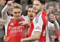 arsenal s martin odegaard l celebrates scoring against manchester city photo afp