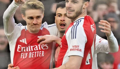 arsenal s martin odegaard l celebrates scoring against manchester city photo afp