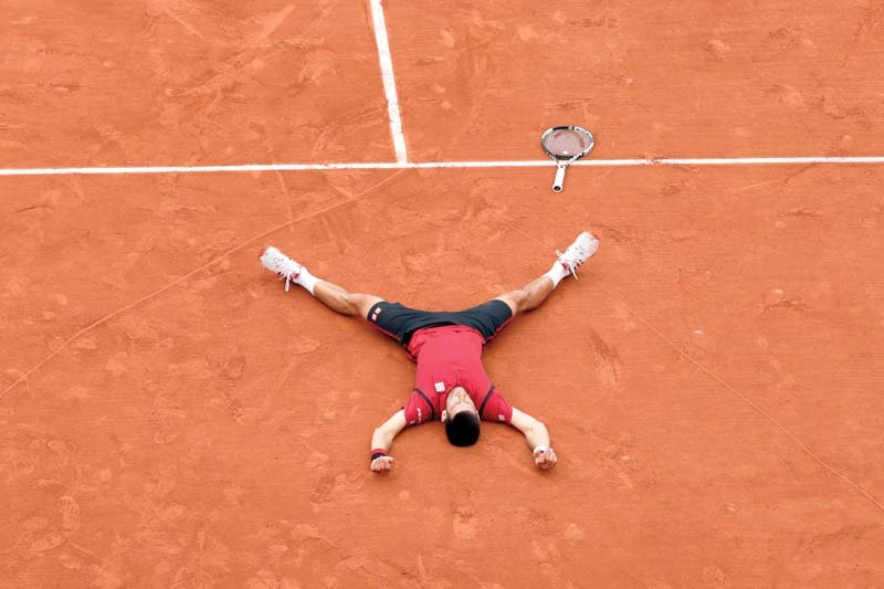 french open win makes serbian first man to claim non year calendar slam since rod laver photo afp