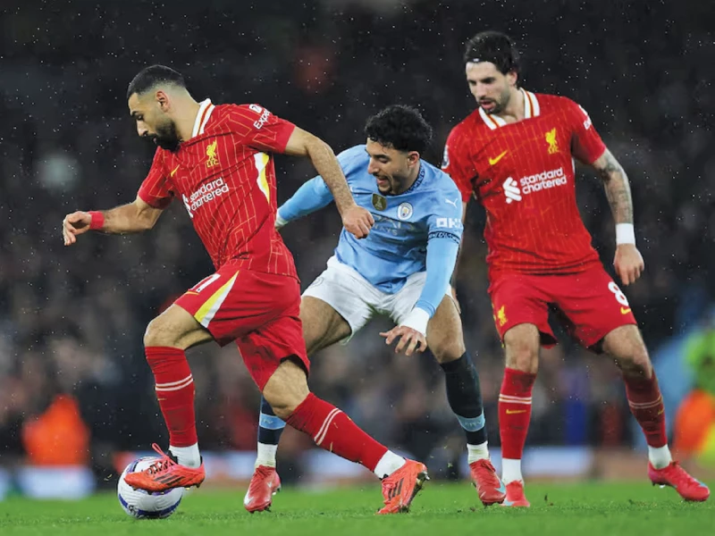 mohamed salah in action with manchester city s omar marmoush photo reuters mohamed salah in action with manchester city s omar marmoush photo reuters