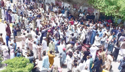government employees including school teachers stage a protest rally against changes in pension rules warning of paralysing government machinery if demands are not met photo inp