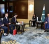 pm invites chinese investment in sezs