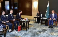 pm invites chinese investment in sezs