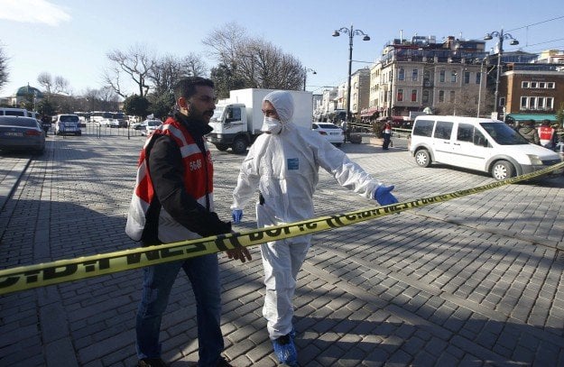 a parked car packed with explosives was detonated by remote control as a police personnel bus passed by photo reuters