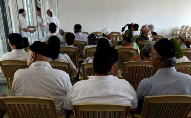 mourners attend a funeral service at a parsi prayer hall in mumbai photo afp mourners attend a funeral service at a parsi prayer hall in mumbai photo afp