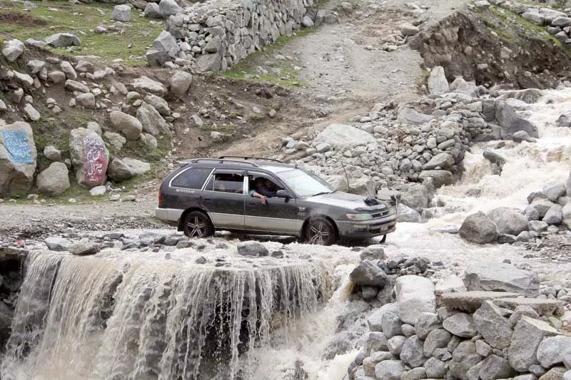 a car is stranded on the broken kalam road photo express a car is stranded on the broken kalam road photo express