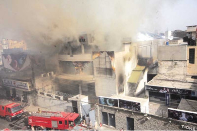 two injured as fire engulfs cinema