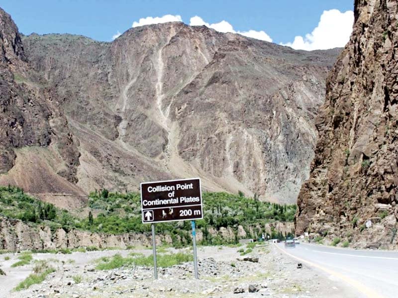 a roadside signboard in nagar valley identifies the spot where the indian and eurasian continental plates collided creating the towering mountains photo express