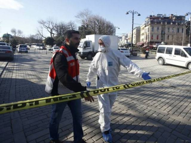 a parked car packed with explosives was detonated by remote control as a police personnel bus passed by photo reuters