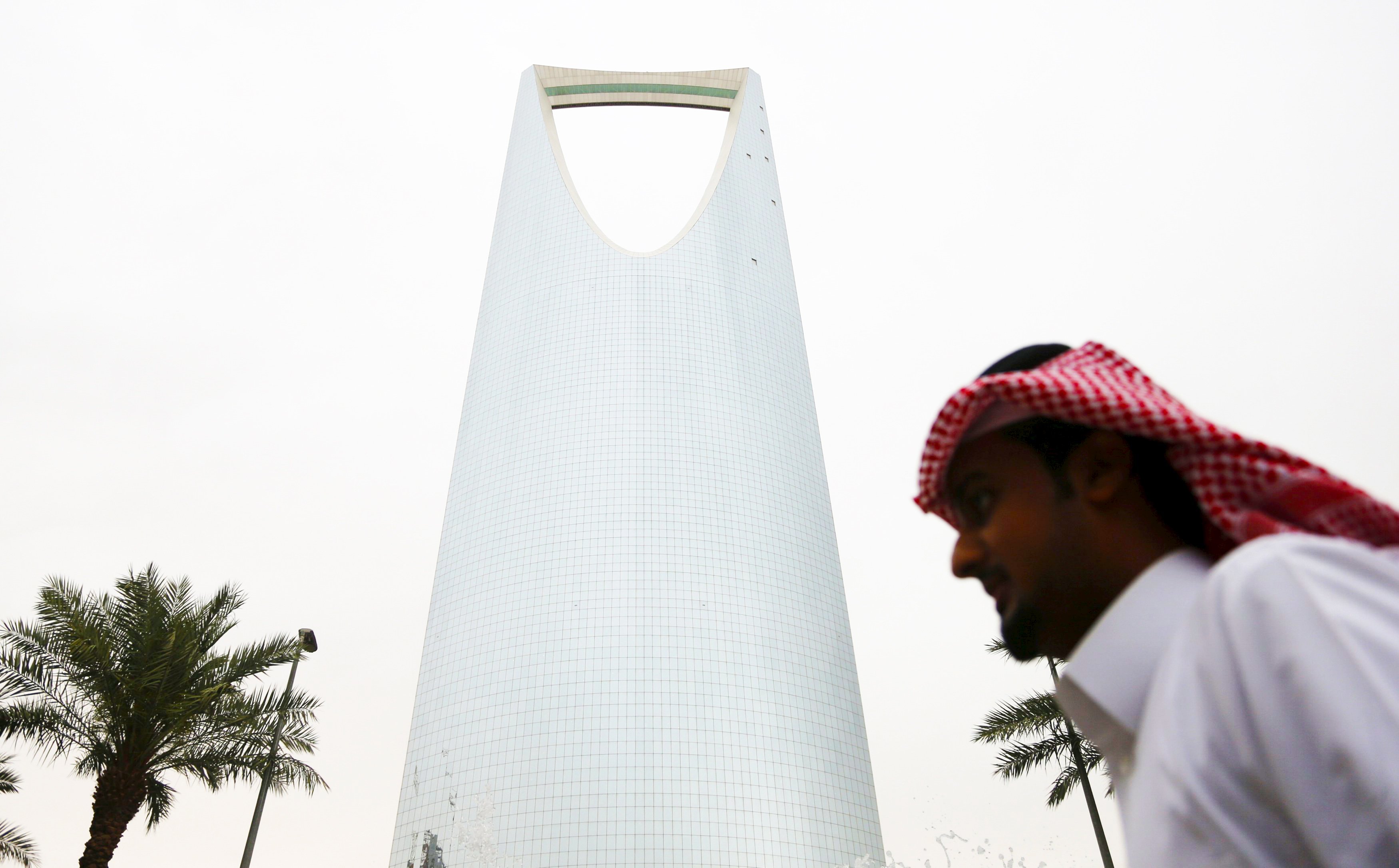 a man walks past the kingdom centre tower in riyadh saudi arabia april 12 2016 photo reuters