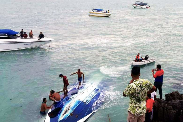 tourists being rescued by thai marine police officers and rescuers after a speedboat capsized at sea photo straittimes