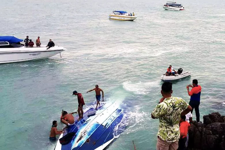 tourists being rescued by thai marine police officers and rescuers after a speedboat capsized at sea photo straittimes tourists being rescued by thai marine police officers and rescuers after a speedboat capsized at sea photo straittimes