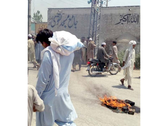 locals blocked shabqadar peshawar road to protest hours long load shedding the protest was led by anp tehsil council member mirajuddin the agitated locals blocked the road in shabqadar at 10am for an hour on wednesday they burnt tyres and did not allow anyone to use the route photo mureeb mohmand express locals blocked shabqadar peshawar road to protest hours long load shedding the protest was led by anp tehsil council member mirajuddin the agitated locals blocked the road in shabqadar at 10am for an hour on wednesday they burnt tyres and did not allow anyone to use the route photo mureeb mohmand express