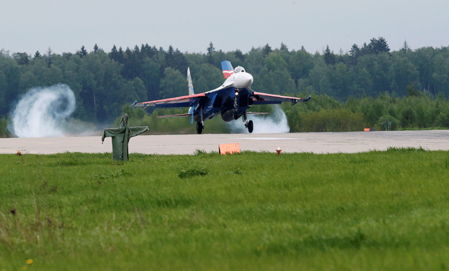 a sukhoi su 27 jet fighter of the russkiye vityazi russian knights aerobatic team lands at an airfield of the kubinka air base outside moscow russia may 21 2016 photo reuters