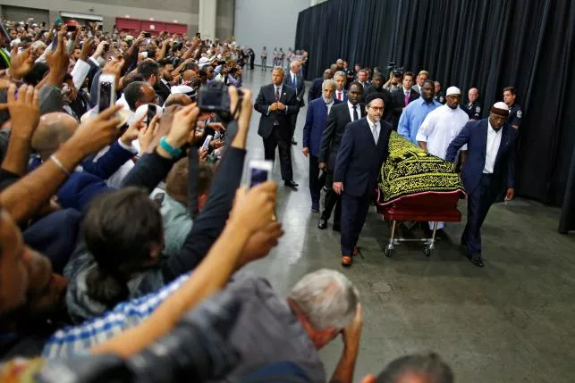 worshipers and well wishers take photographs as the casket with the body of the late boxing champion muhammad ali is brought for his jenazah an islamic funeral prayer in louisville kentucky us june 9 2016 photo reuters