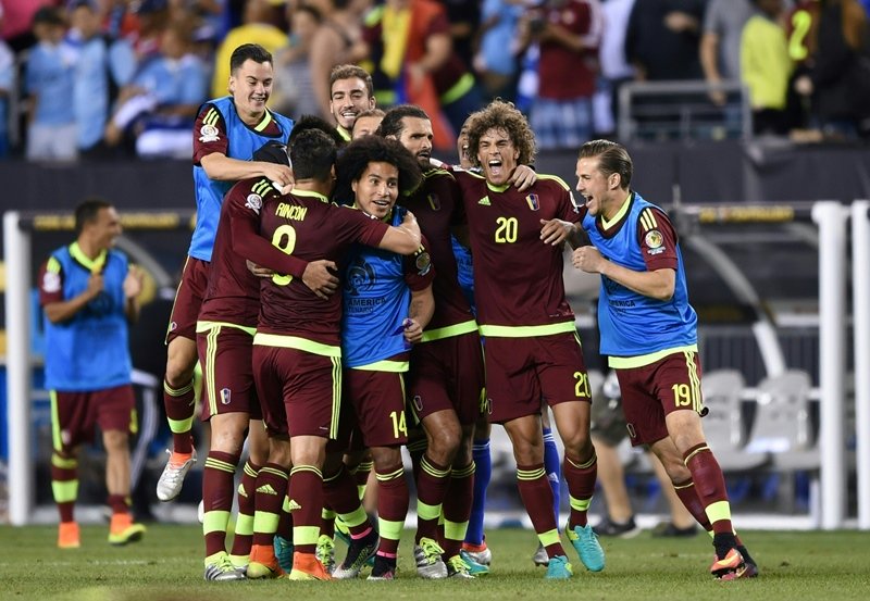 players of venezuela celebrate after defeating uruguay in the copa america centenario football tournament in philadelphia pennsylvania united states on june 9 2016 photo afp